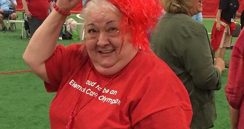 element care senior participating as a cheerleader at annual Olympics