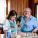 senior woman cooking with her granddaughter