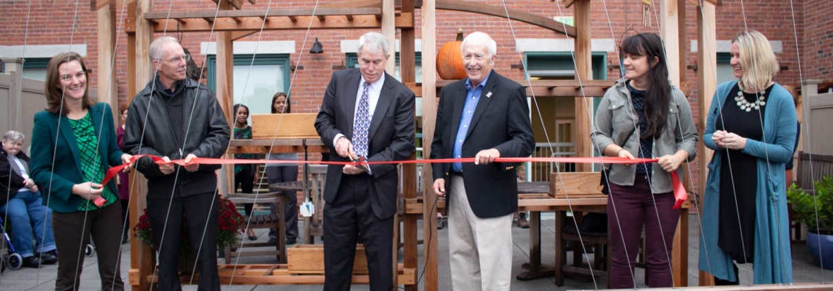 ribbon cutting ceremony at rooftop garden