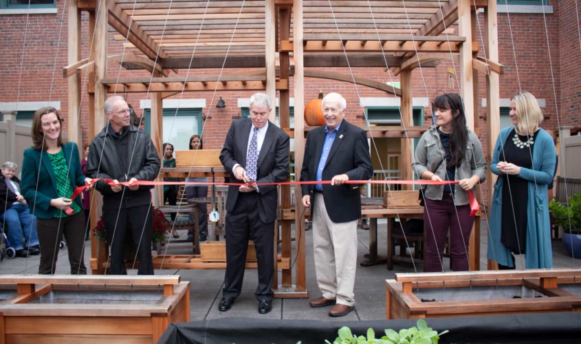 ribbon cutting ceremony at rooftop garden